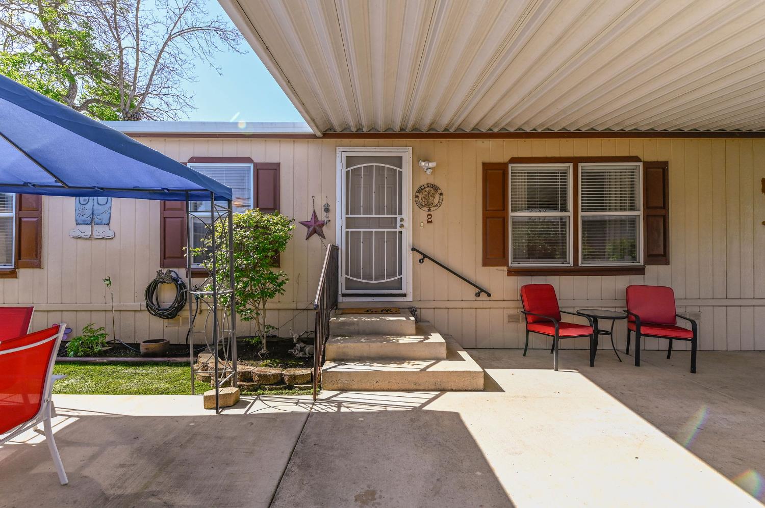 1400 West Marlette Street, Unit 2 Ione, CA 95640 - Photo 56 of 79 a front view of a house with outdoor seating