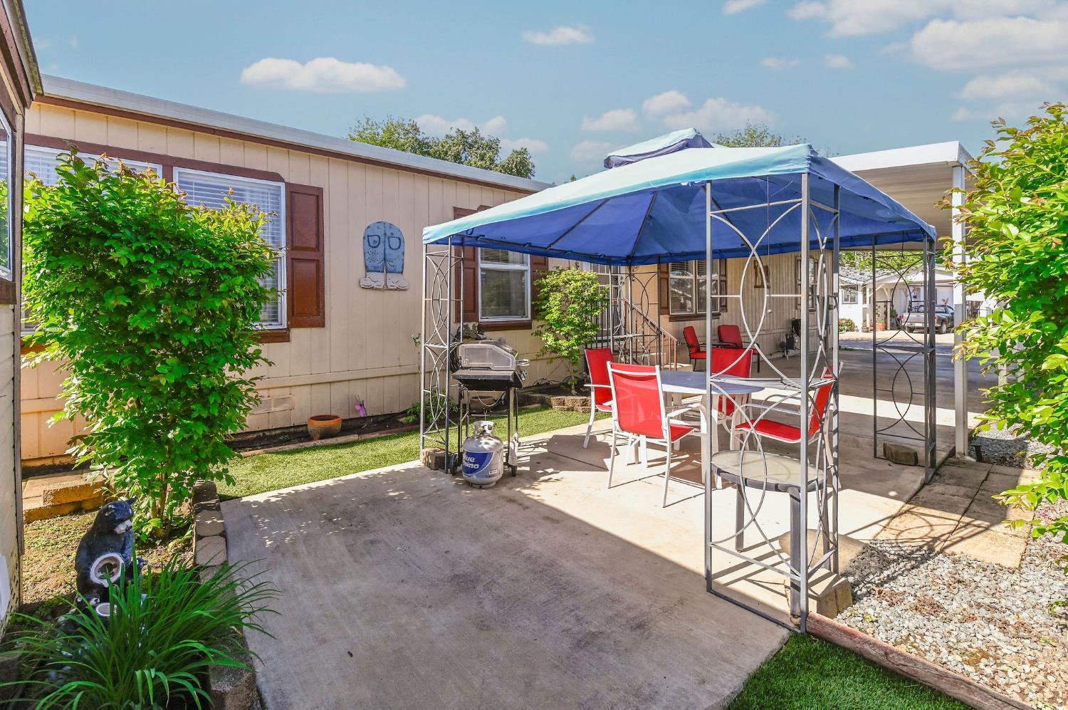 1400 West Marlette Street, Unit 2 Ione, CA 95640 - Photo 58 of 79 a view of a chairs and table in backyard of the house