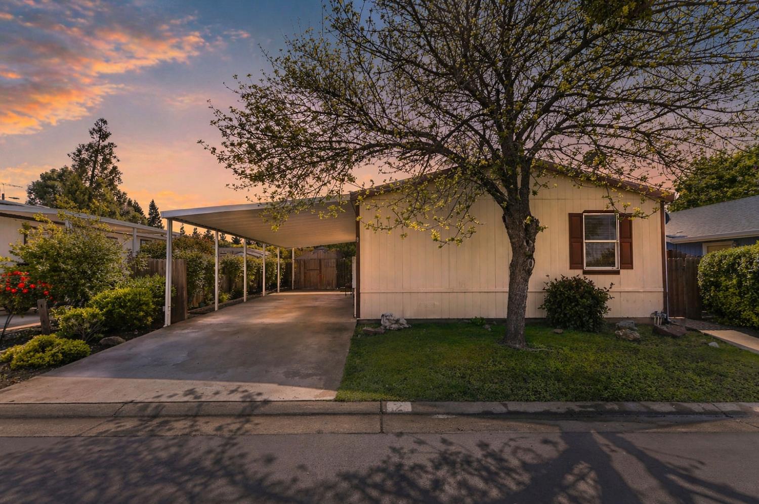 1400 West Marlette Street, Unit 2 Ione, CA 95640 - Photo 64 of 79 a view of a white house with a yard