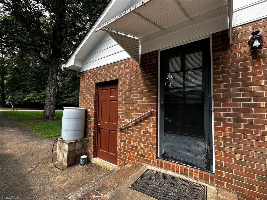 3724 Frazier Road Greensboro, NC 27407 - Photo 23 of 26 Outside storage room & Side entrance