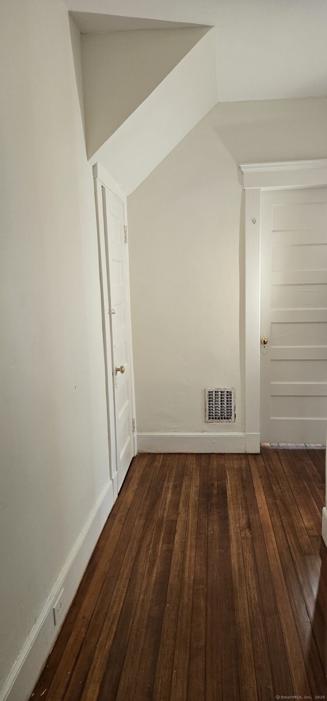 47 Dickerman Street, Unit 1 New Haven, CT 06511 - Photo 15 of 16 a view of an empty room with wooden floor