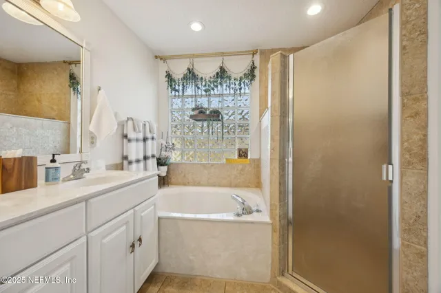 a bathroom with a toilet a sink and a mirror