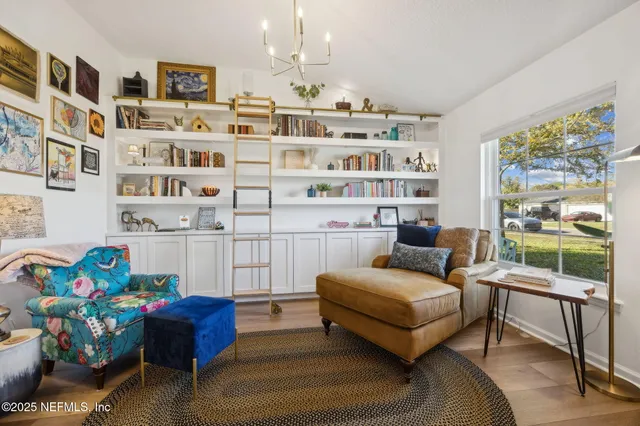 a front view of a house with a garden and porch