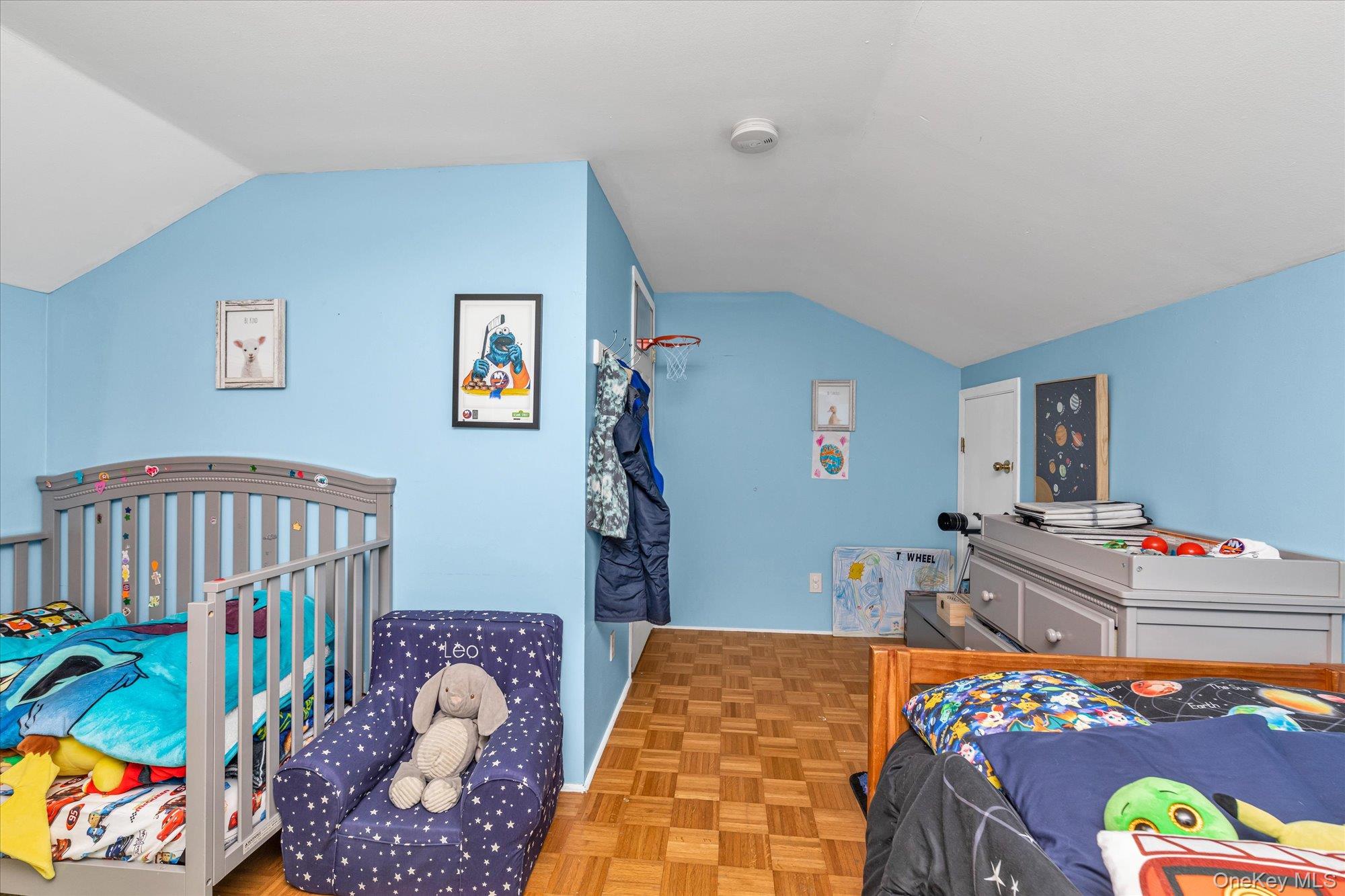 1894 Commonwealth Avenue Merrick, NY 11566 - Photo 17 of 22 a bedroom with furniture and a wooden floor