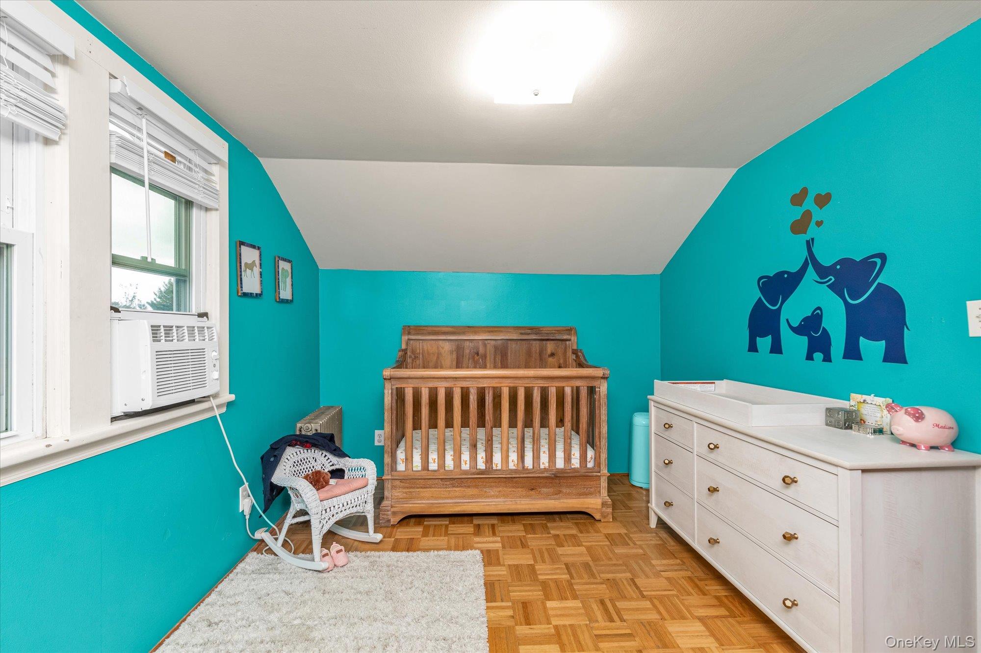 1894 Commonwealth Avenue Merrick, NY 11566 - Photo 19 of 22 a bedroom with furniture and a window