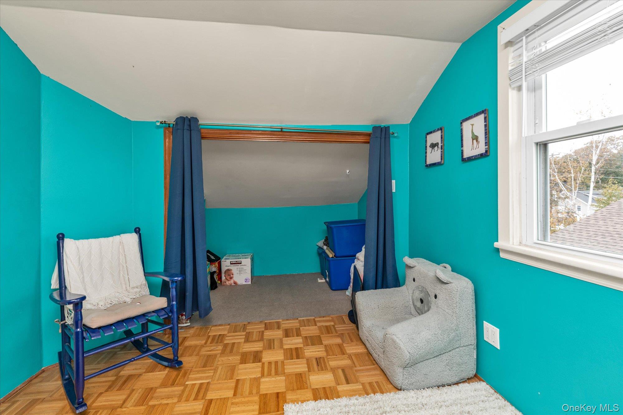 1894 Commonwealth Avenue Merrick, NY 11566 - Photo 20 of 22 a living room with furniture and a window