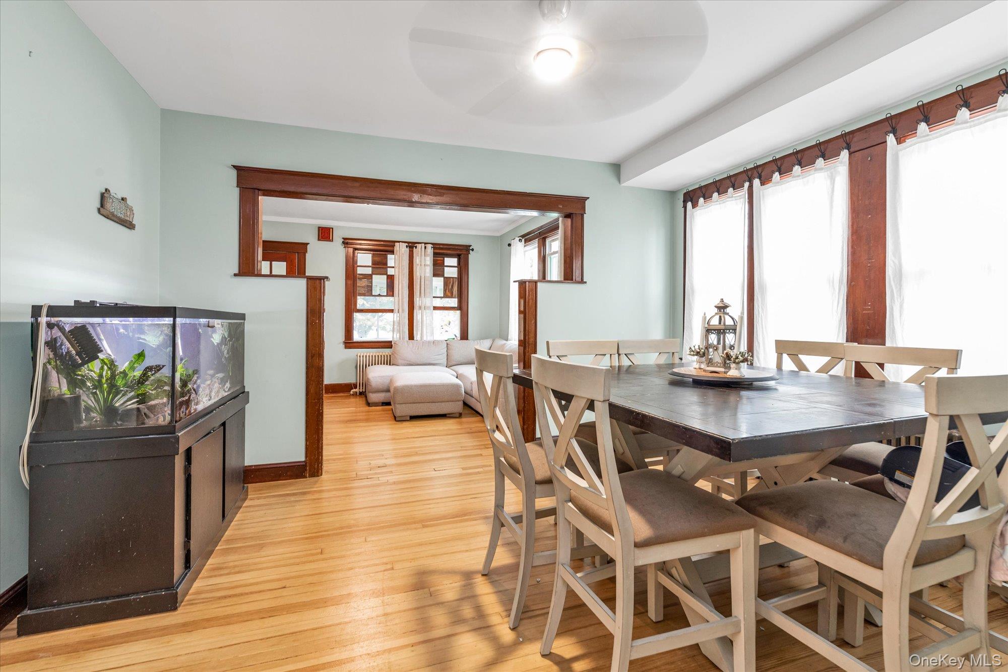 1894 Commonwealth Avenue Merrick, NY 11566 - Photo 8 of 22 a view of a dining room with furniture window and wooden floor