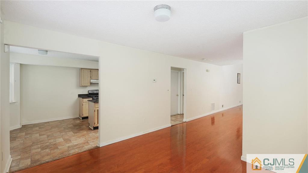 169 Nebula Road Piscataway, NJ 08854 - Photo 17 of 31 a view of a room with wooden floor