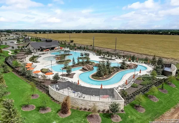 a view of a lake with sitting area