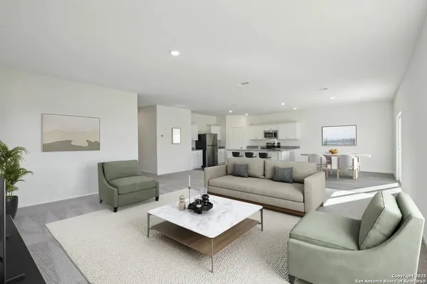 a living room with furniture and a couch