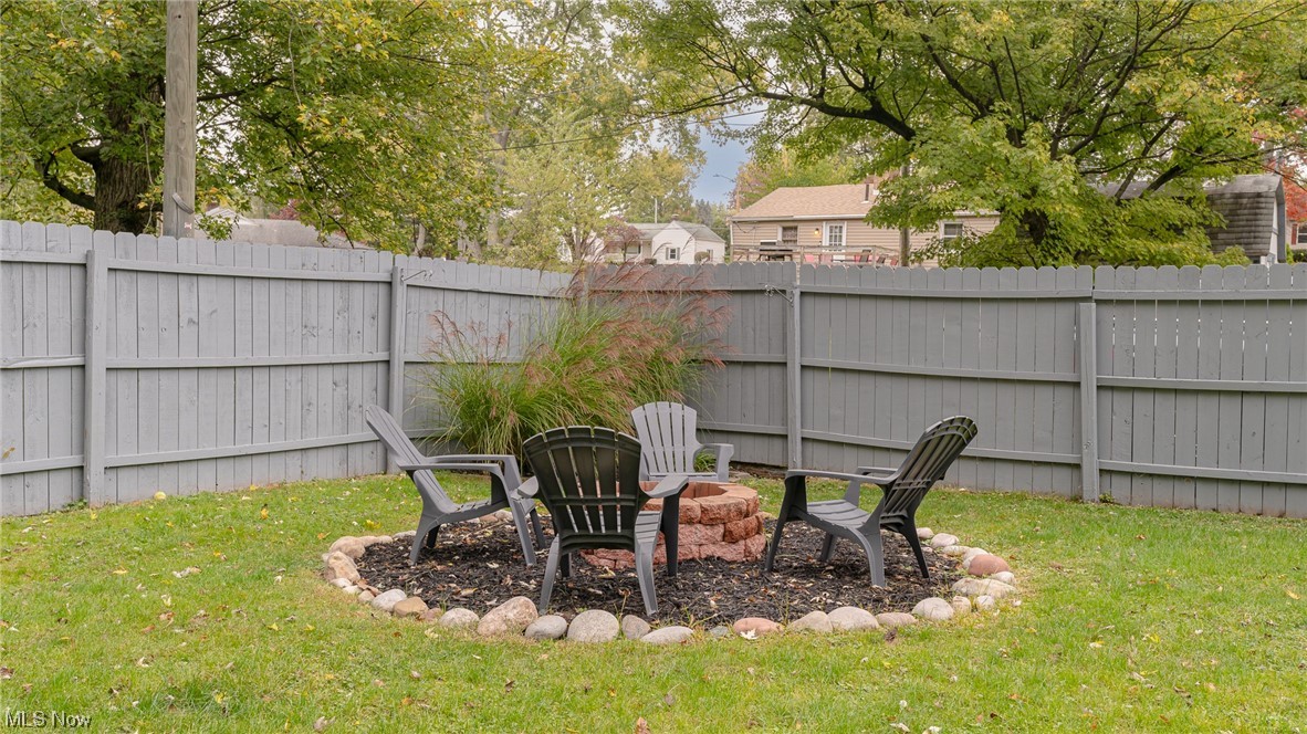 301 Perry Drive Northwest Canton, OH 44708 - Photo 9 of 34 View of yard with a fire pit