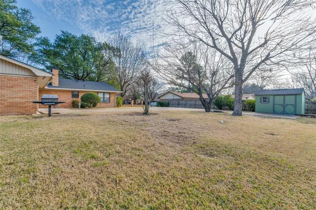 a view of house with outdoor space and street view