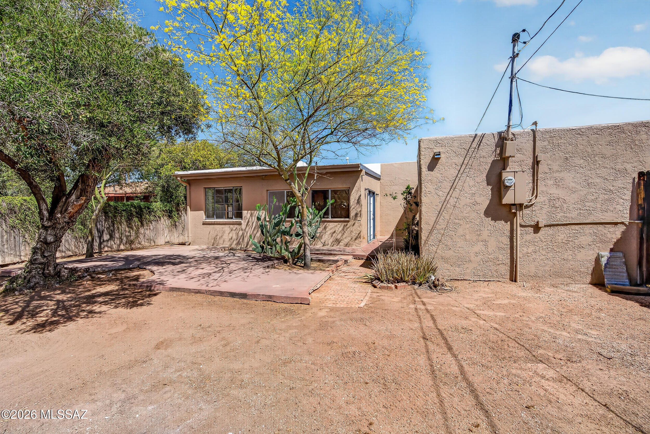 1412 East Spring Street Tucson, AZ 85719 - Photo 38 of 43 a view of a house with snow on the road