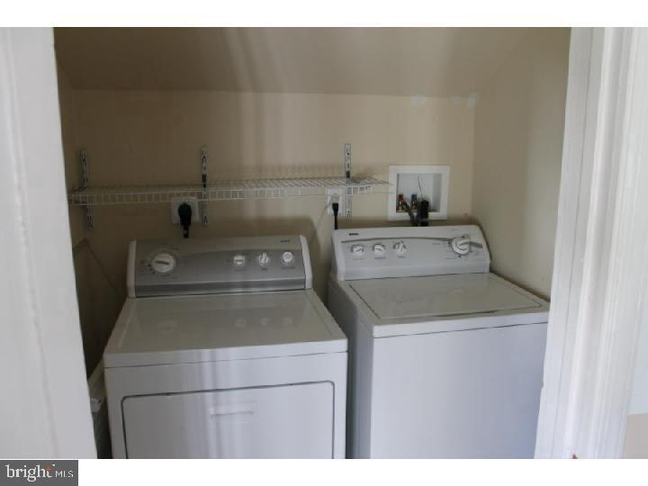 1698 Pennington Road, Unit 2 Trenton, NJ 08618 - Photo 3 of 7 a utility room with dryer and washer