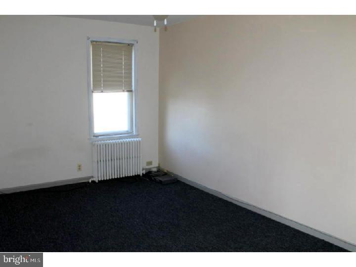 1698 Pennington Road, Unit 2 Trenton, NJ 08618 - Photo 7 of 7 a view of an empty room with a window