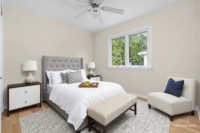 a bedroom with a bed and window