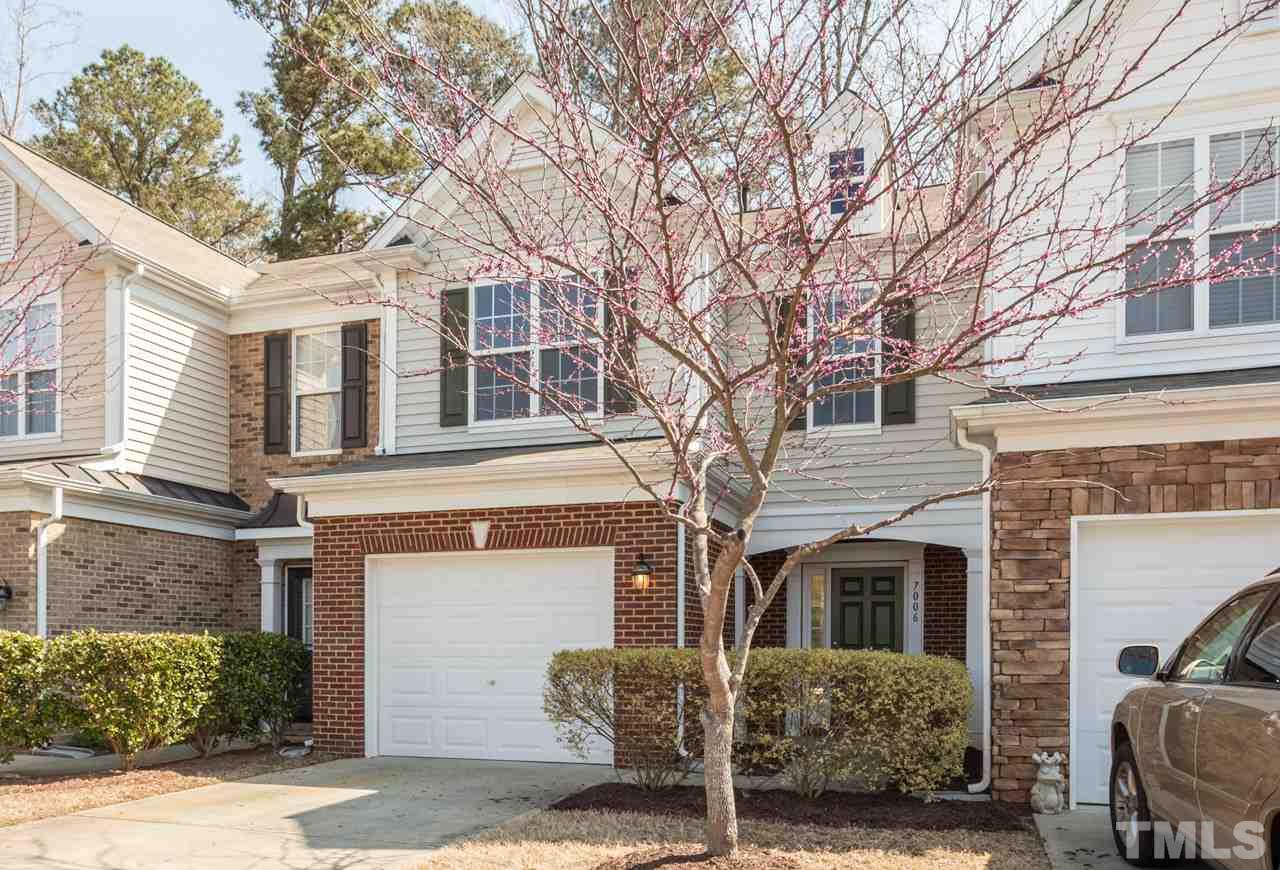 7006 Racine Way Raleigh, NC 27690 - Photo 15 of 24 a front view of a house with a yard