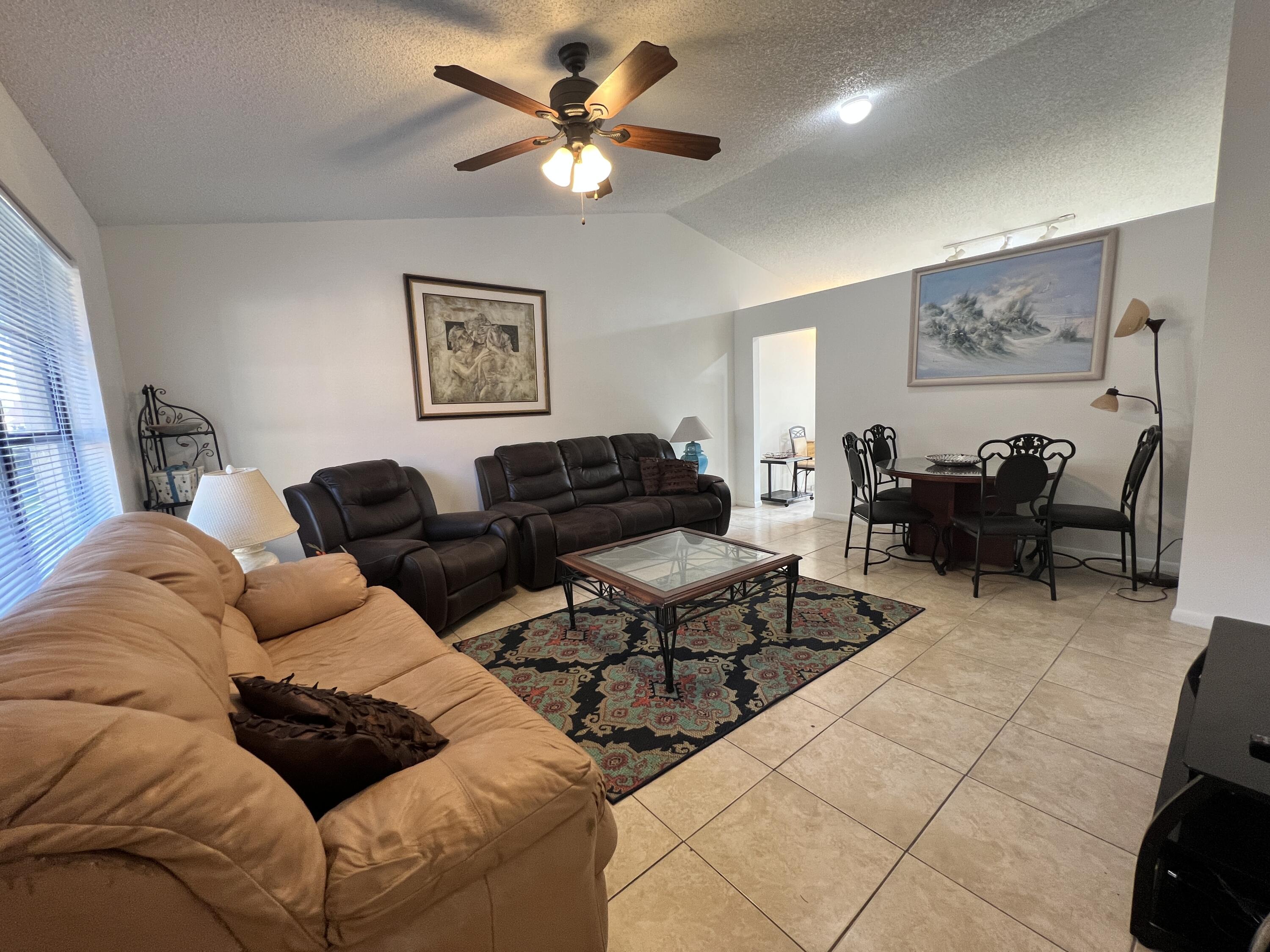 1104 Goldenrod Road, Unit C Wellington, FL 33414 - Photo 1 of 7 IMG_5433