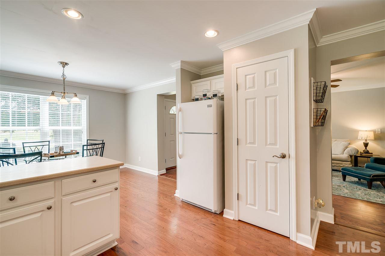 6008 East Pool Road Rougemont, NC 27572 - Photo 11 of 25 a kitchen with a refrigerator sink and cabinets