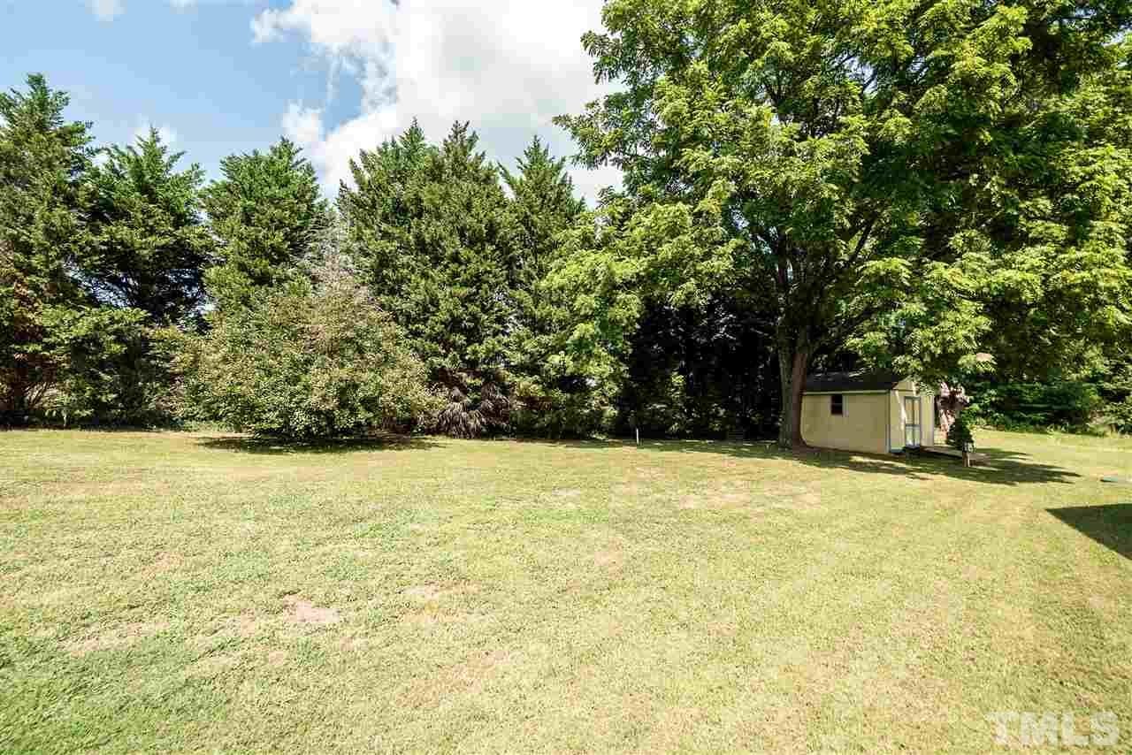 6008 East Pool Road Rougemont, NC 27572 - Photo 21 of 25 a view of a yard with a trees