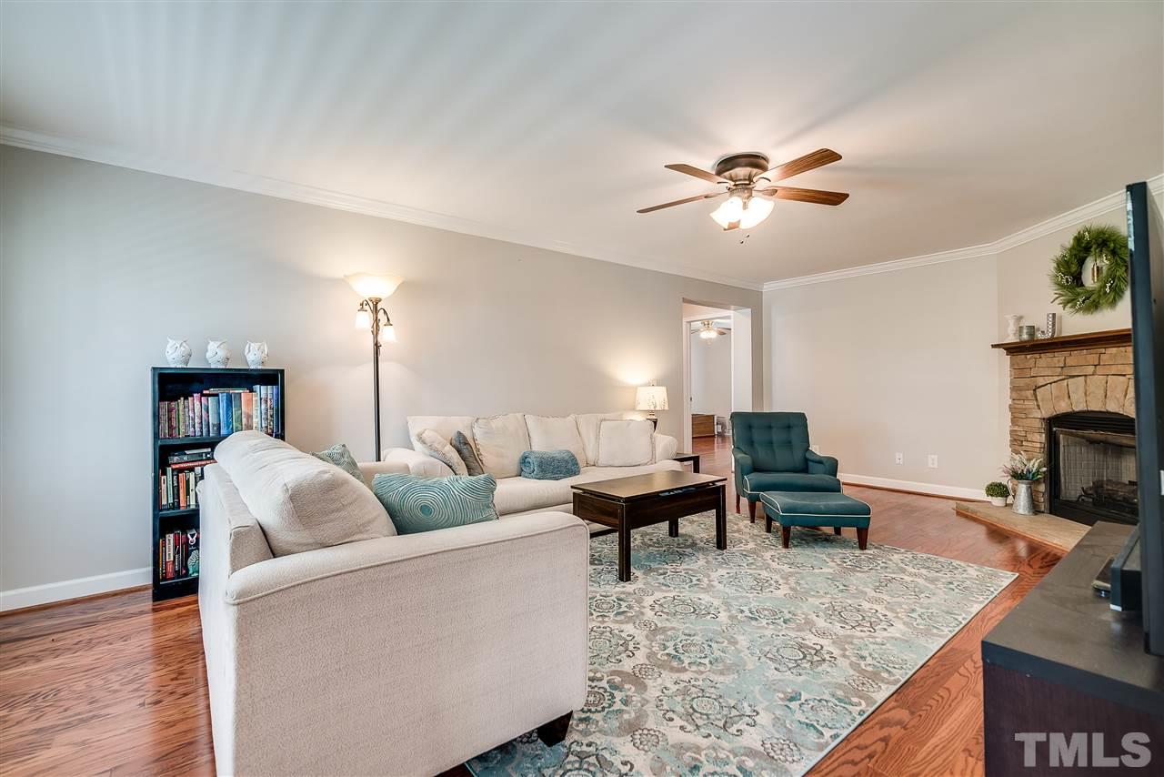 6008 East Pool Road Rougemont, NC 27572 - Photo 4 of 25 a living room with furniture and a fireplace