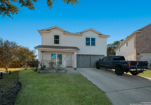 a house view with a garden space