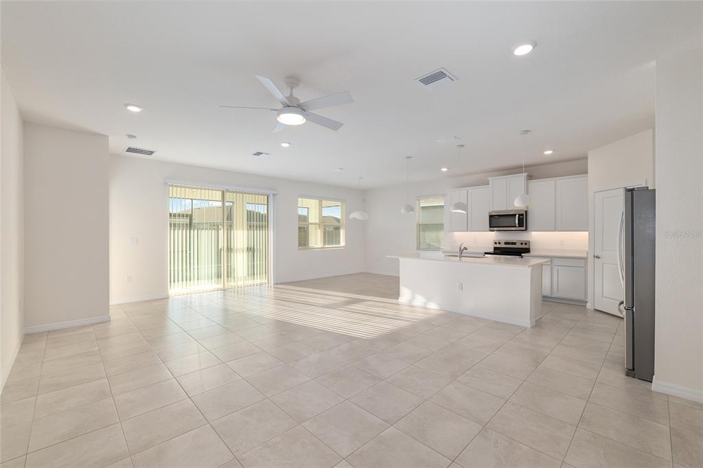 3972 Northwest 48th Terrace Ocala, FL 34482 - Photo 14 of 63 a view of kitchen with windows sink and refrigerator