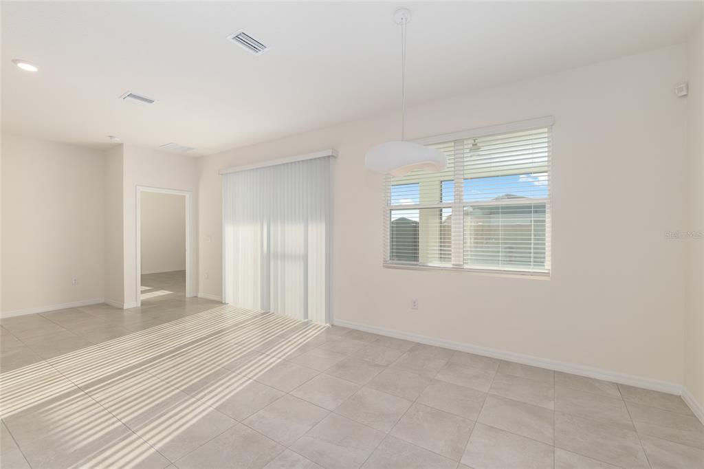3972 Northwest 48th Terrace Ocala, FL 34482 - Photo 19 of 63 a view of an empty room with a window