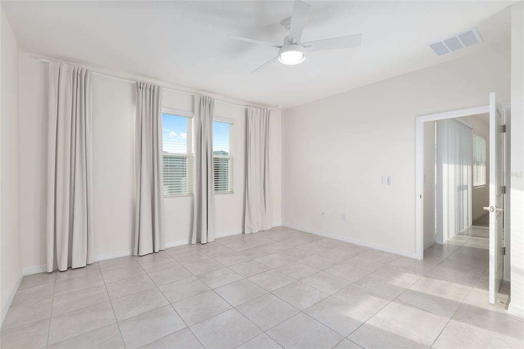 3972 Northwest 48th Terrace Ocala, FL 34482 - Photo 31 of 63 an empty room with windows and closet