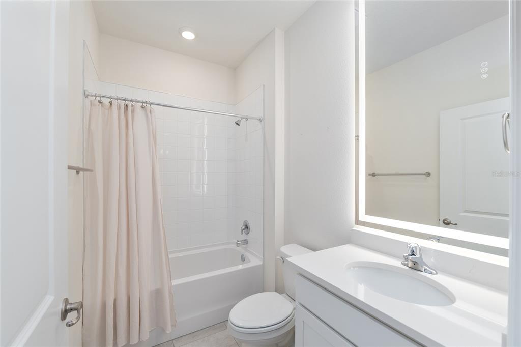 3972 Northwest 48th Terrace Ocala, FL 34482 - Photo 42 of 63 a bathroom with a sink toilet and shower