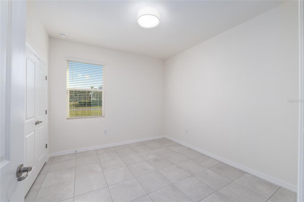 3972 Northwest 48th Terrace Ocala, FL 34482 - Photo 47 of 63 an empty room with a window