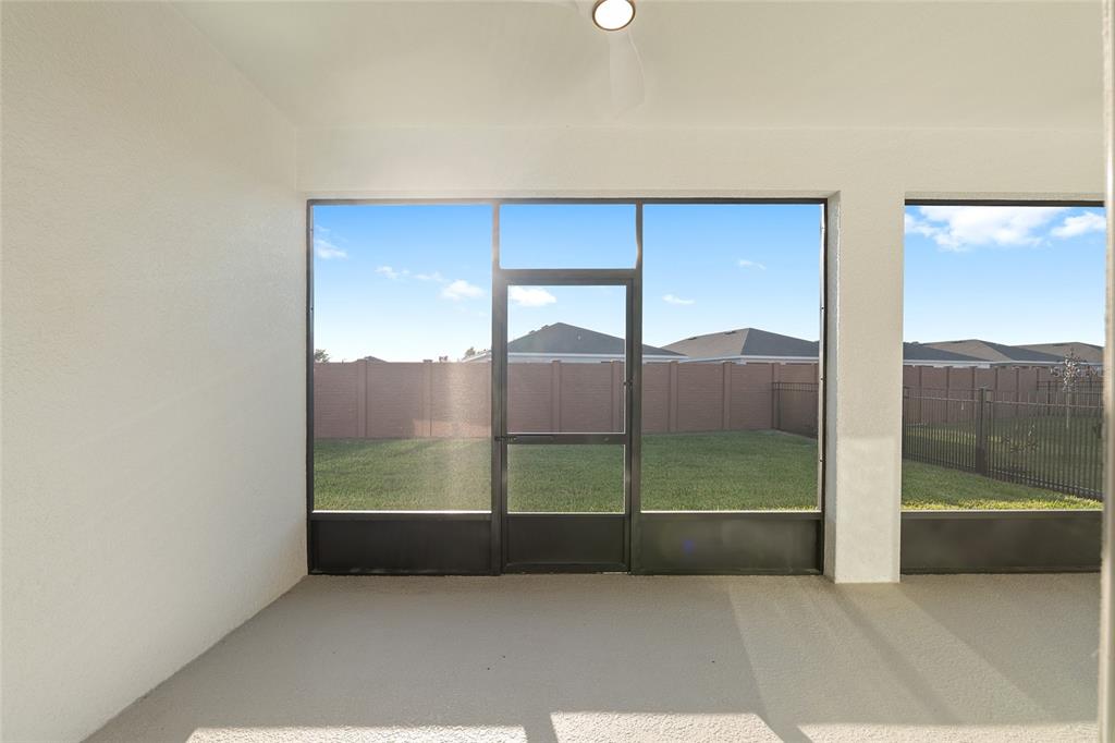 3972 Northwest 48th Terrace Ocala, FL 34482 - Photo 53 of 63 a view of an empty room with a floor to ceiling window