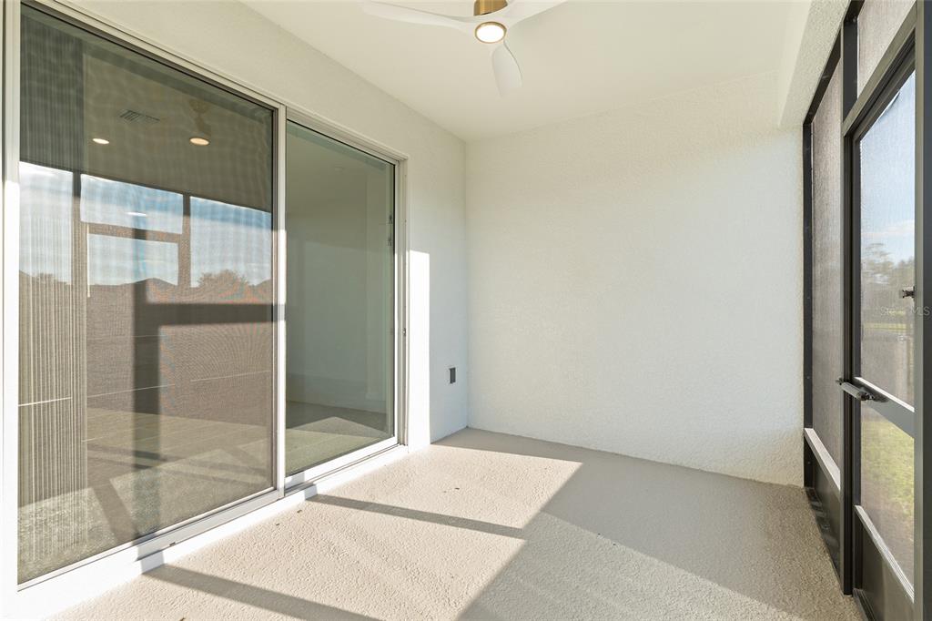 3972 Northwest 48th Terrace Ocala, FL 34482 - Photo 56 of 63 a view of a hallway with a glass door