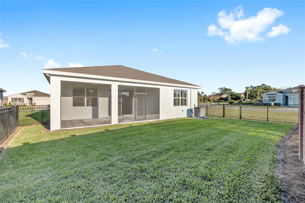 3972 Northwest 48th Terrace Ocala, FL 34482 - Photo 60 of 63 a front view of a house with a yard