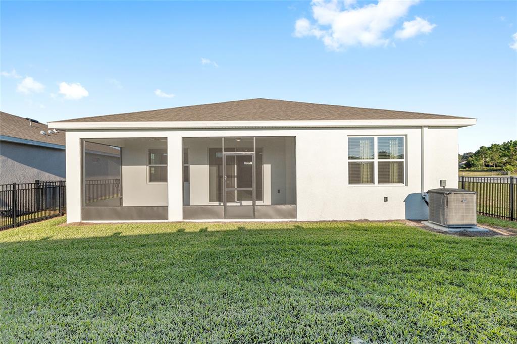3972 Northwest 48th Terrace Ocala, FL 34482 - Photo 62 of 63 a view of a house with a yard and sitting area