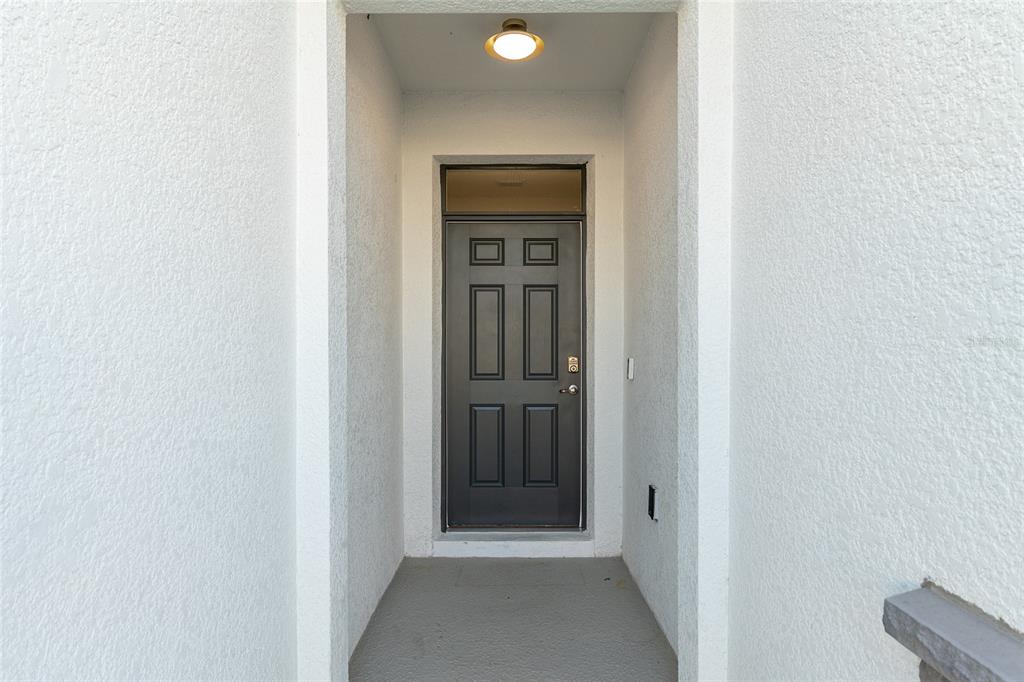 3972 Northwest 48th Terrace Ocala, FL 34482 - Photo 8 of 63 a view of a hallway with front door