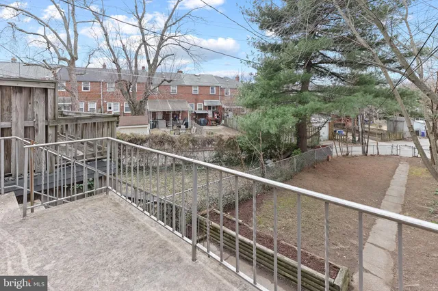 a view of a balcony with city view