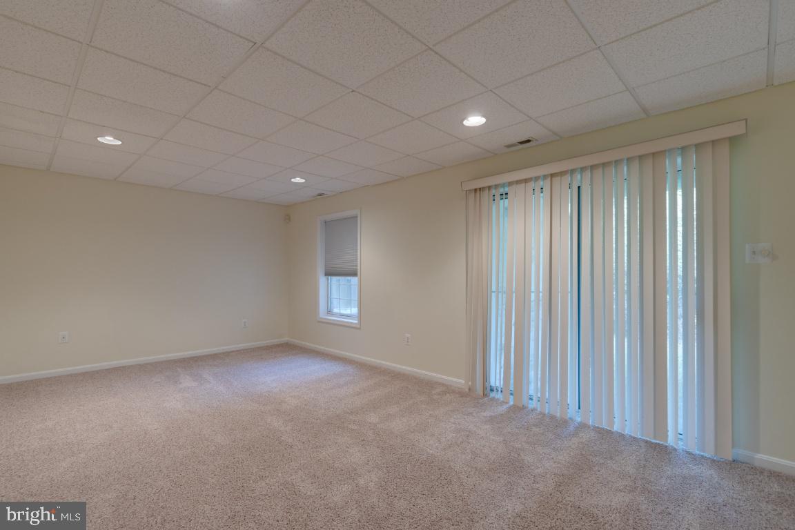 6192 Good Hunters Ride Columbia, MD 21045 - Photo 31 of 42 Finished Lower Level Rec Room w/ Walk Out to Yard