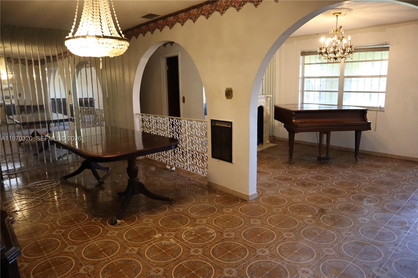 6514 Southwest 107th Place Miami, FL 33173 - Photo 6 of 18 a view of a dining room with furniture