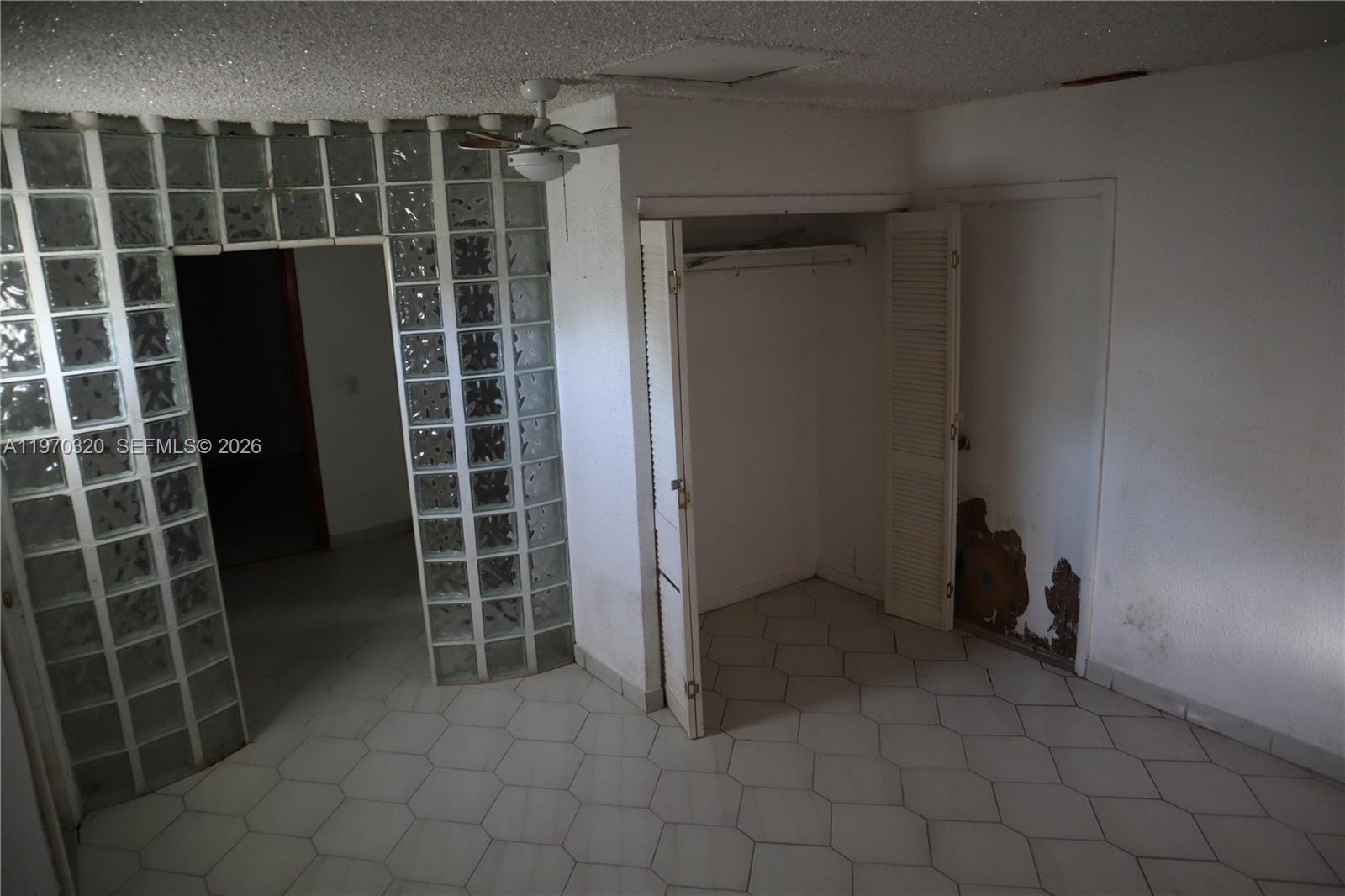 6514 Southwest 107th Place Miami, FL 33173 - Photo 10 of 18 a view of an empty walk in closet