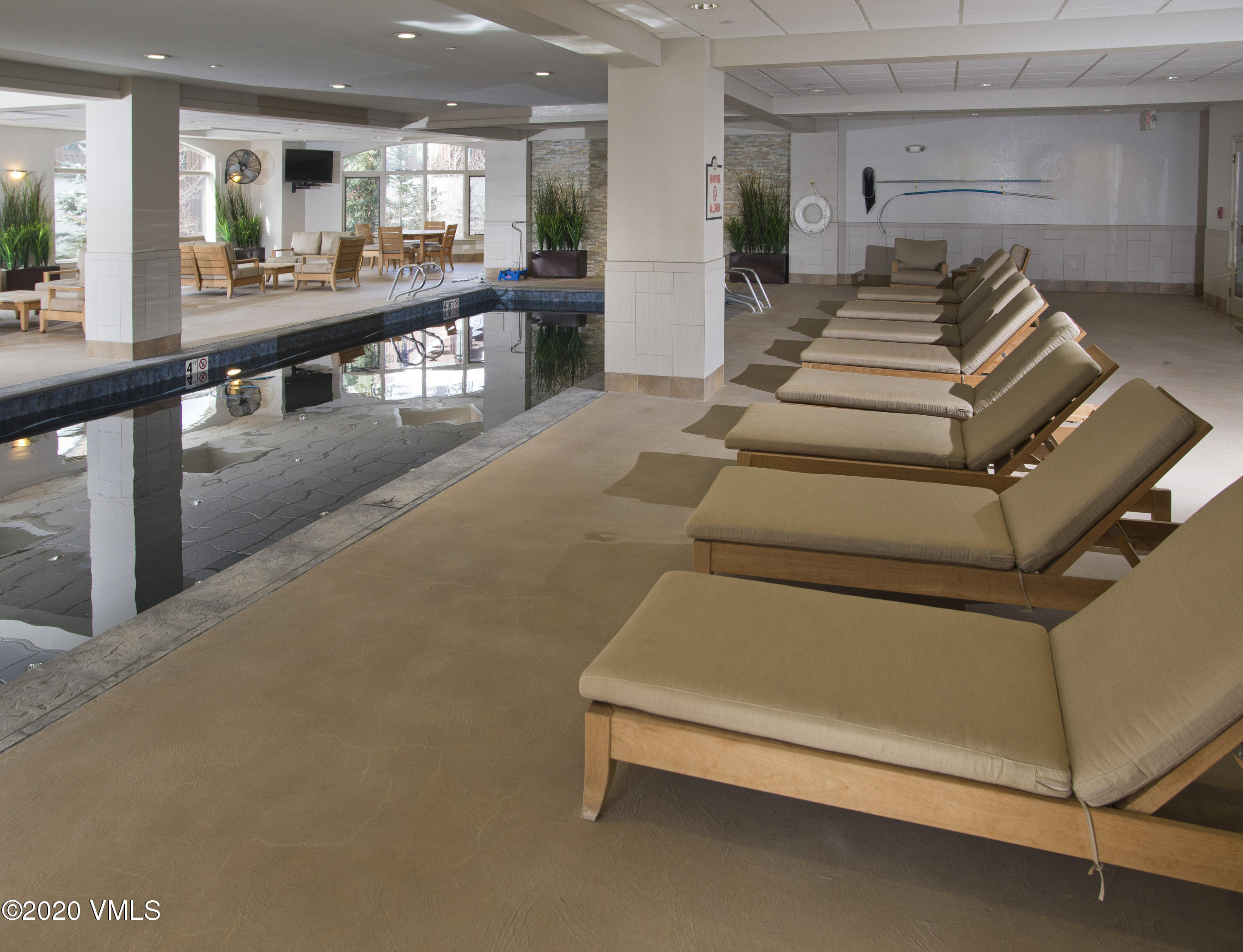 210 Offerson Road, Unit 209 WEEK 11 Beaver Creek, CO 81620 - Photo 31 of 37 a living room with furniture