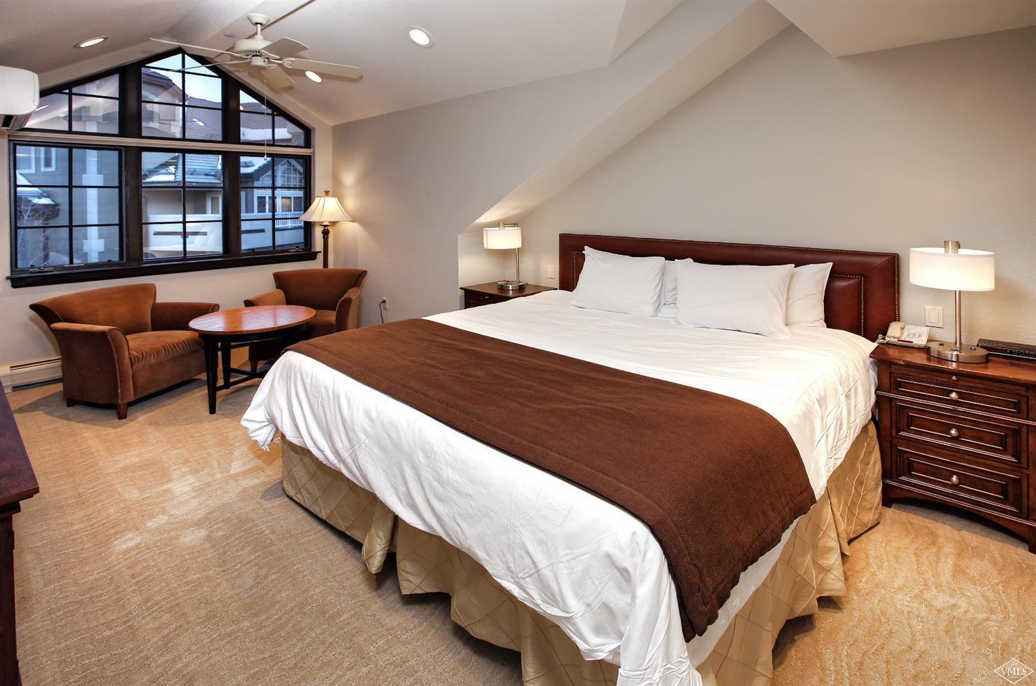 210 Offerson Road, Unit 209 WEEK 11 Beaver Creek, CO 81620 - Photo 8 of 37 a spacious bedroom with two beds and a large window