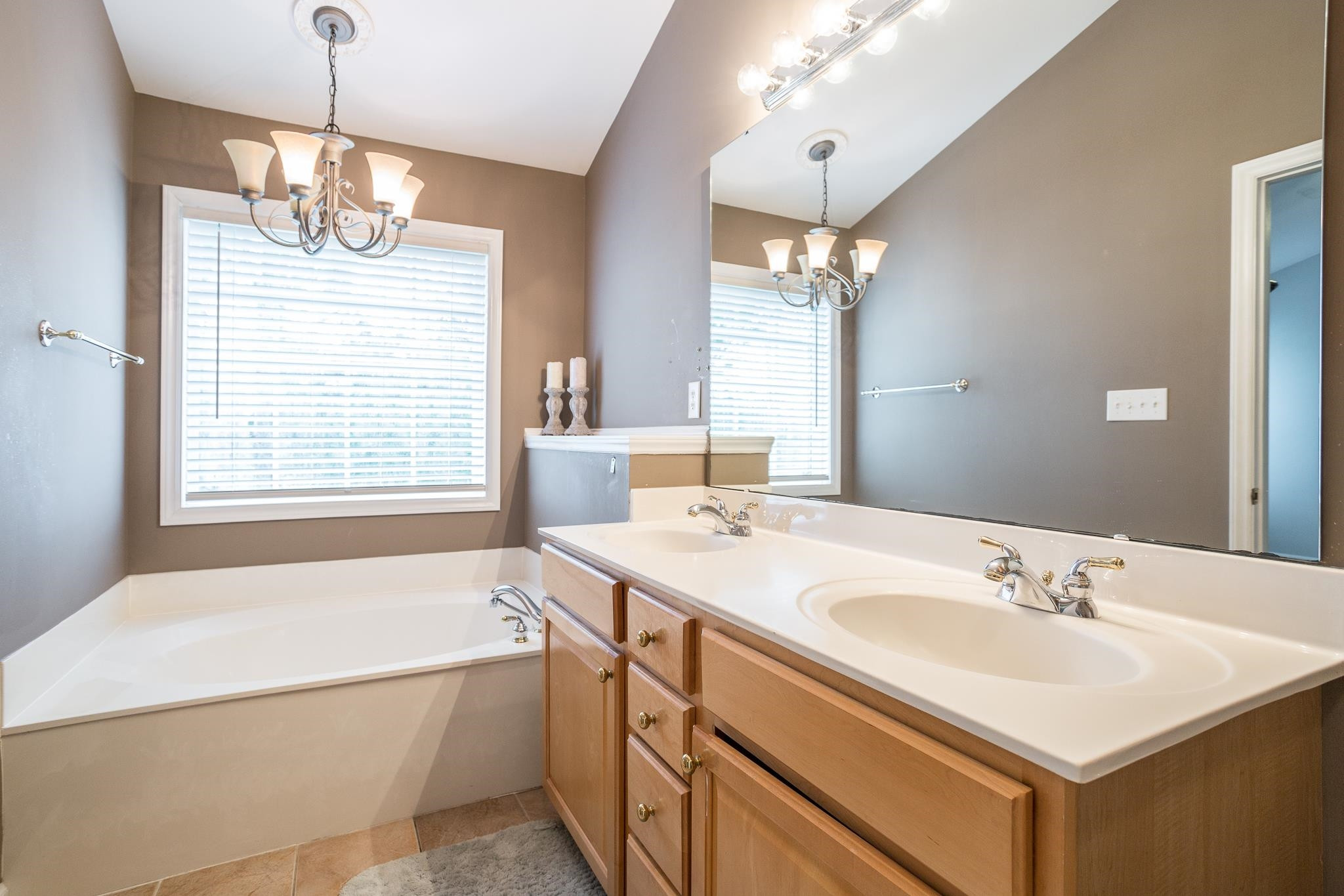 6905 Middleboro Drive Raleigh, NC 27612 - Photo 17 of 23 Luxuriate in the master bath, complete with a large soaking tub, separate shower, and double vanity! Master Bath/Spa