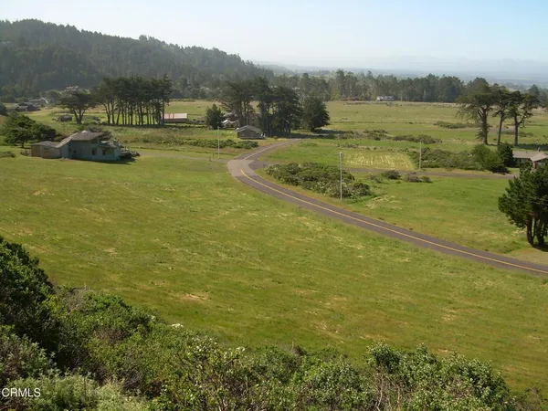 a view of a lake with a mountain