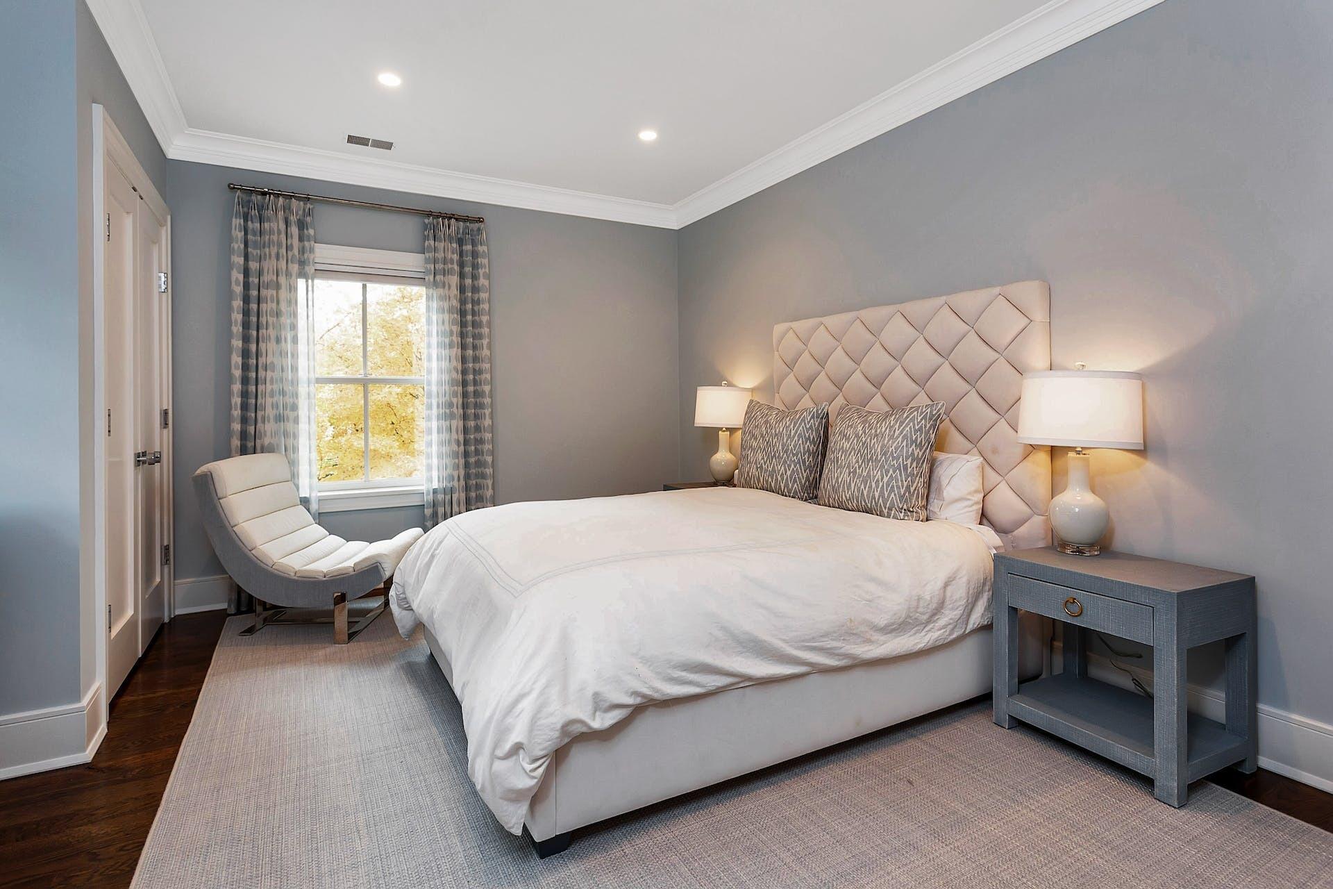 75 Parish Road New Canaan, CT 06840 - Photo 20 of 38 a bedroom with a bed and a window