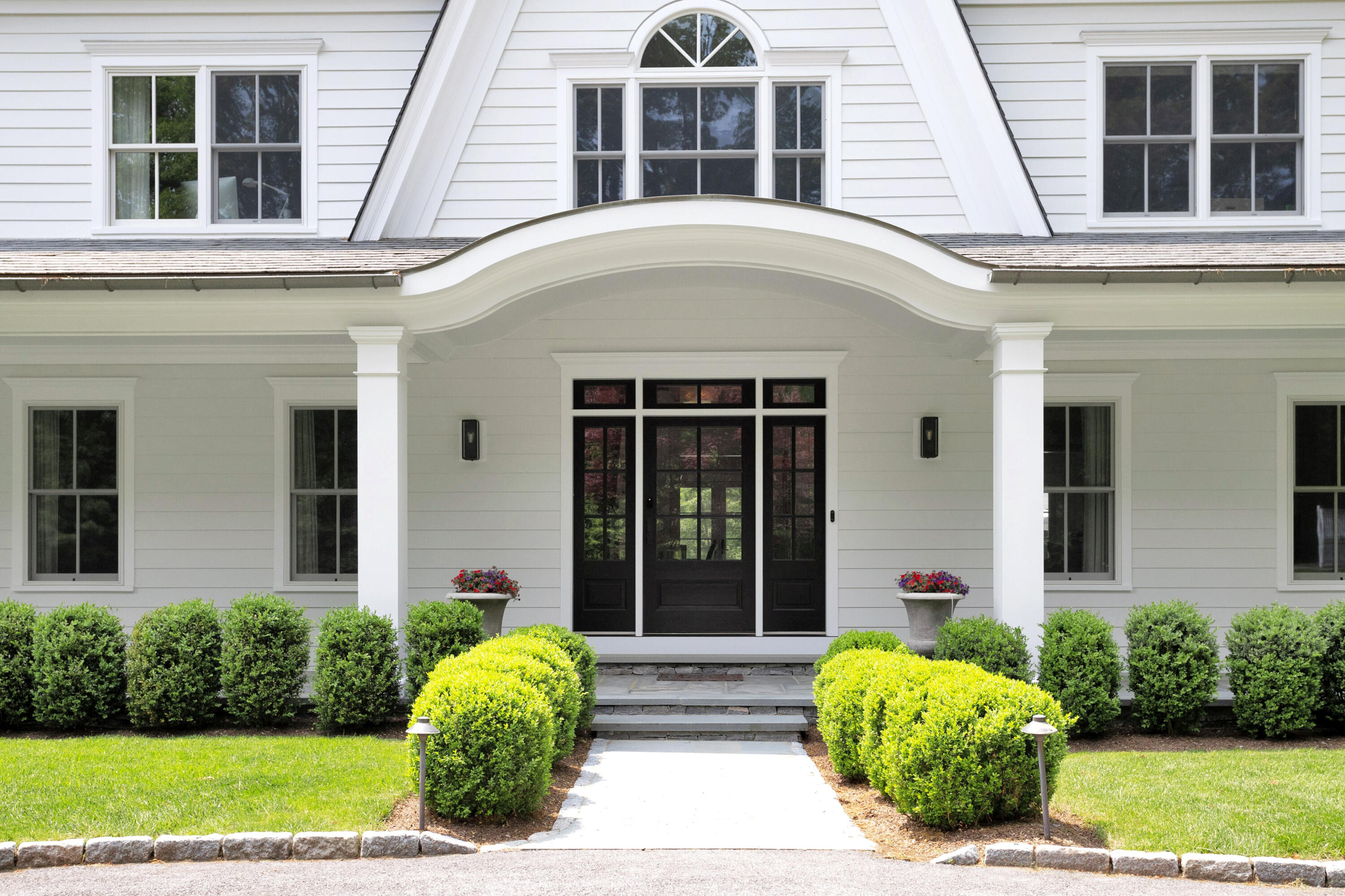 75 Parish Road New Canaan, CT 06840 - Photo 3 of 38 front view of a house with a yard