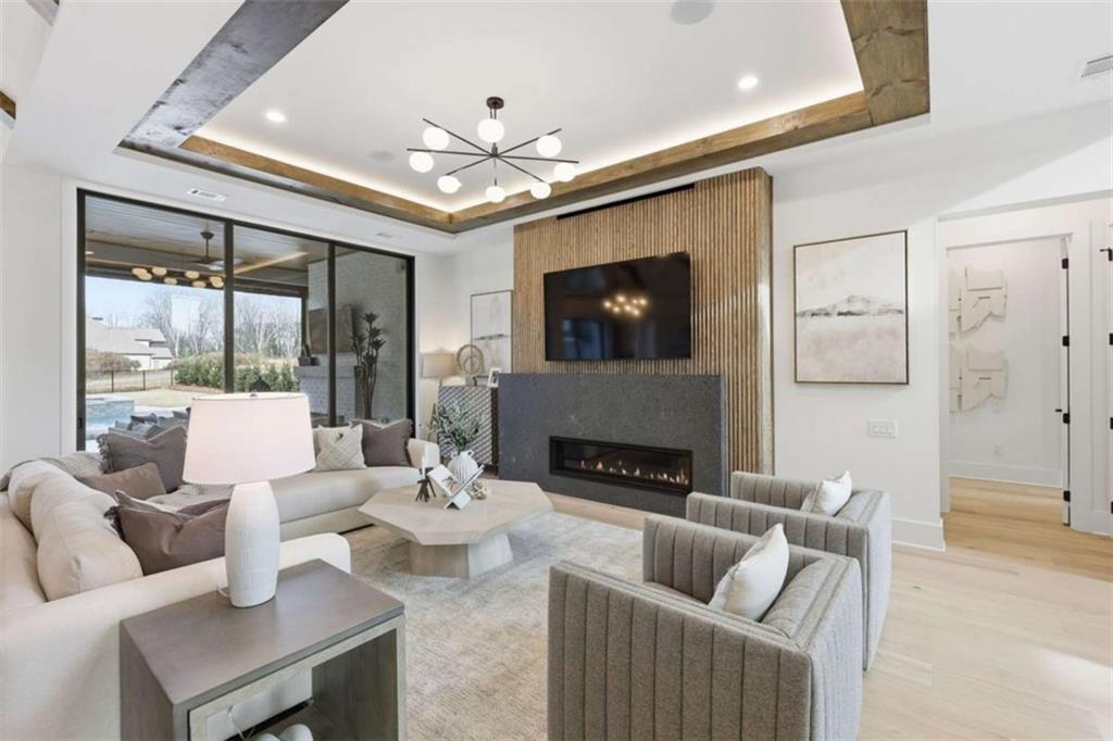 4632 A Shirley Road Gainesville, GA 30506 - Photo 11 of 72 a living room with furniture and a fireplace