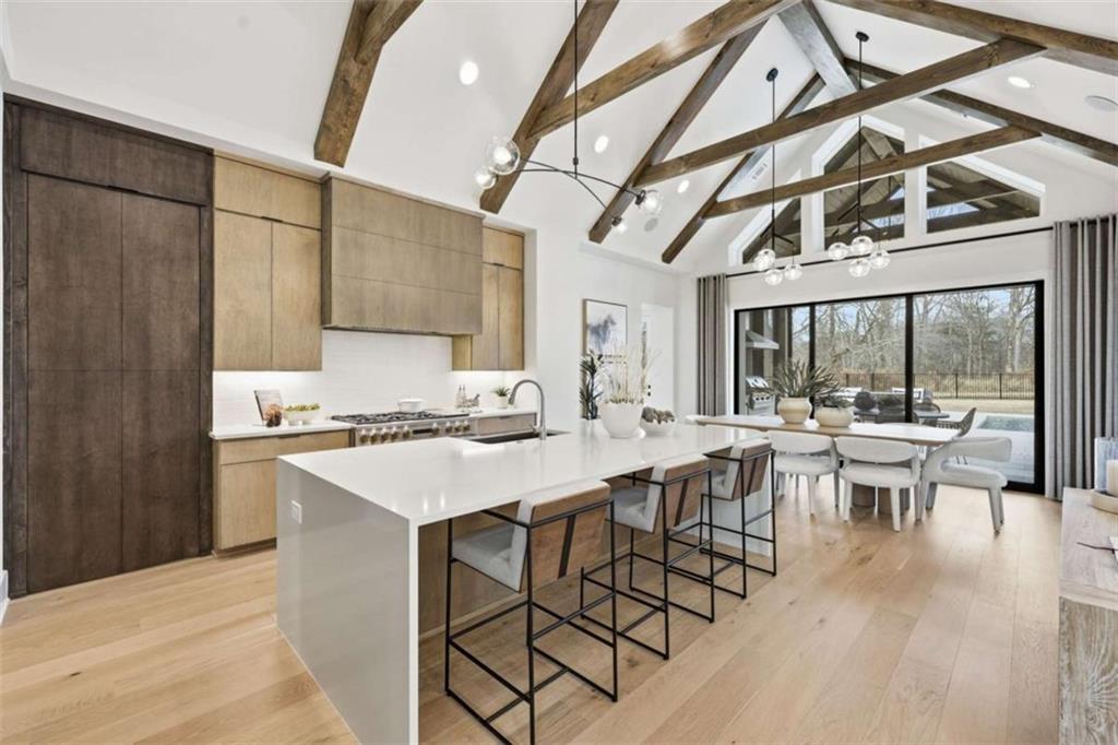 4632 A Shirley Road Gainesville, GA 30506 - Photo 15 of 72 a kitchen with a table and chairs in it