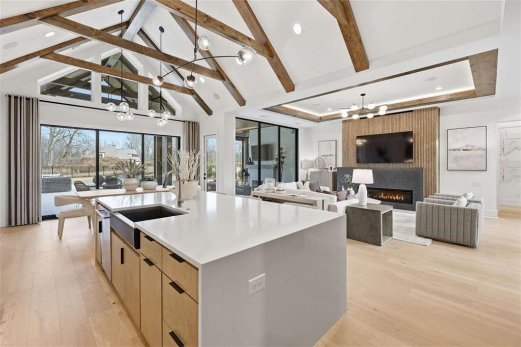 4632 A Shirley Road Gainesville, GA 30506 - Photo 16 of 72 a open kitchen with stainless steel appliances granite countertop a lot of counter space and windows