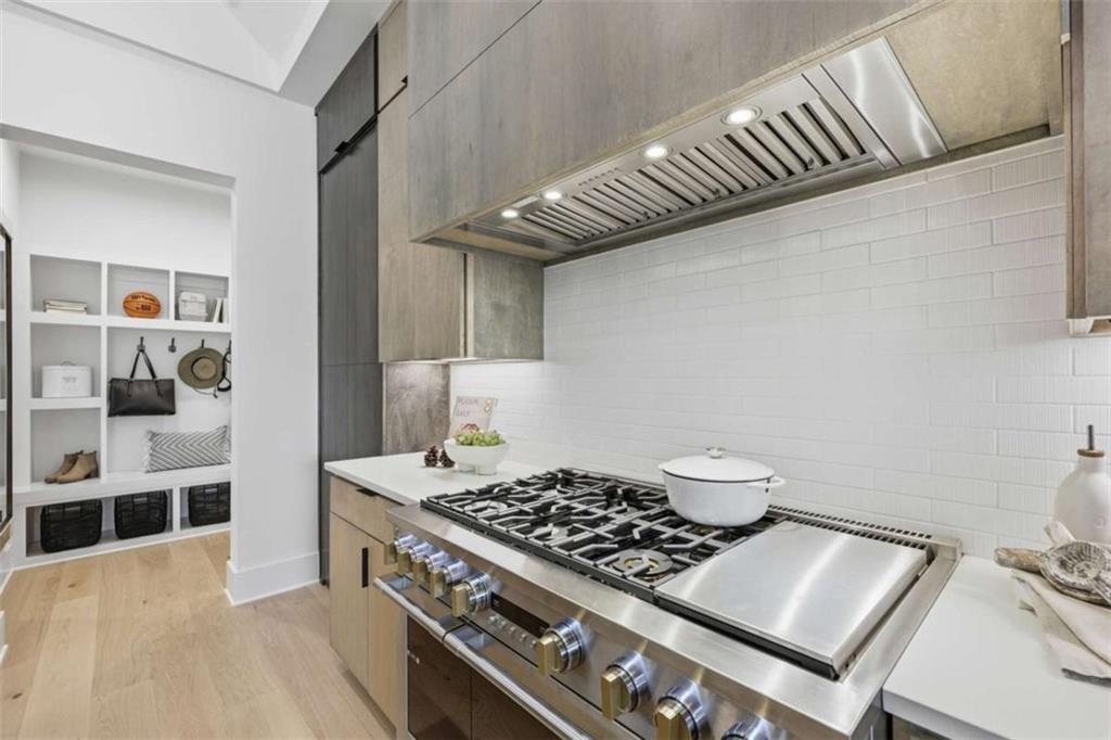 4632 A Shirley Road Gainesville, GA 30506 - Photo 17 of 72 a kitchen with a stove and a view of living room